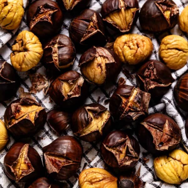 Air fried chestnuts on a kitchen cloth from the top view.