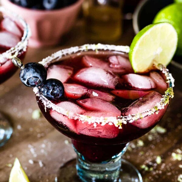 Blueberry Margarita garnished with blueberries and lime