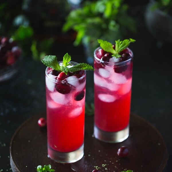 Two glasses of Cranberry and Mint Rum Punch