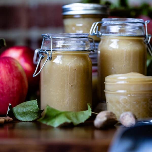 Applesauce made in crockpot are in jars.