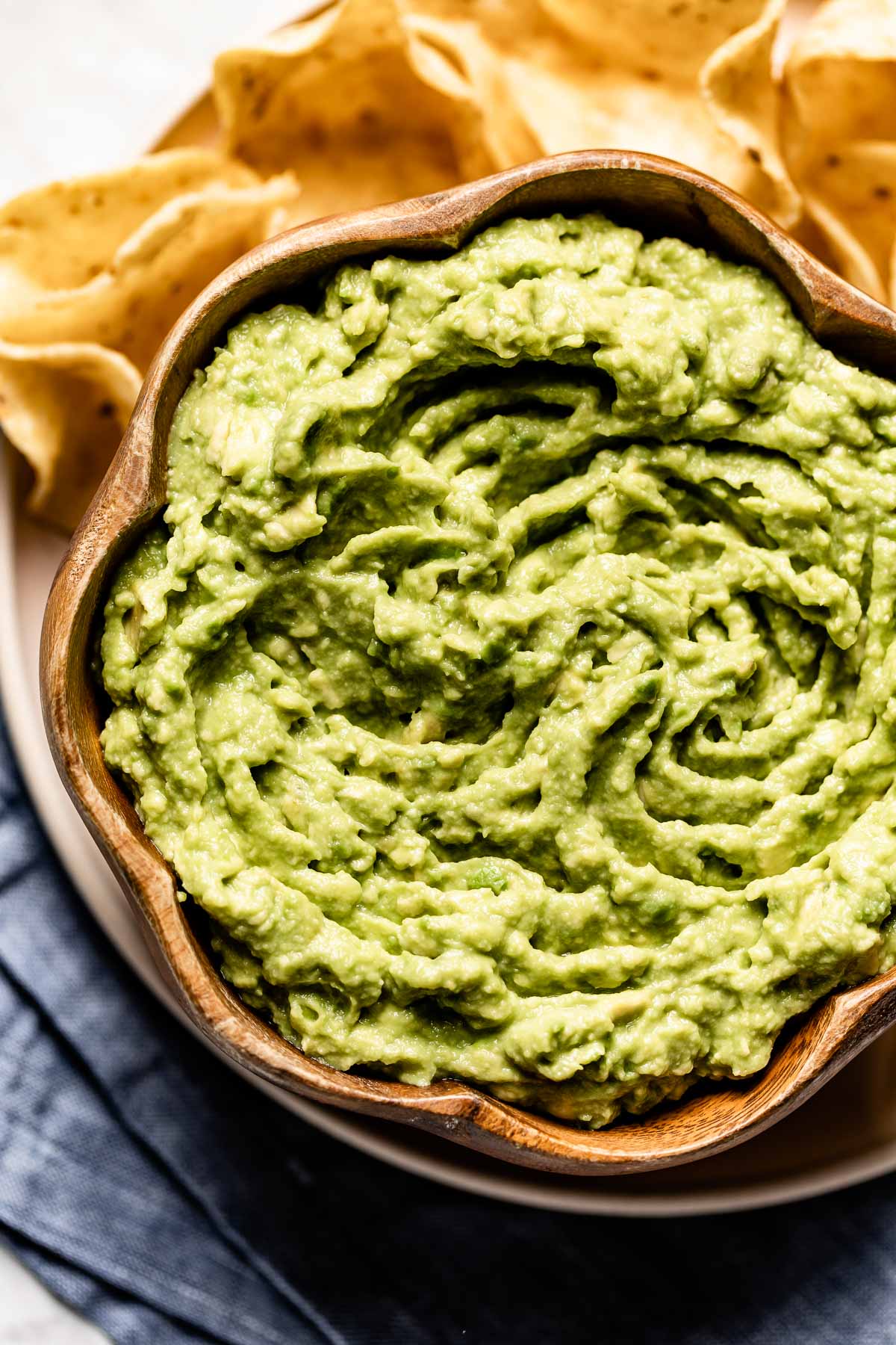 A bowl of guacamole for the ultimate game day food.