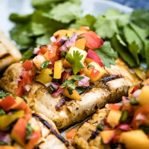 Grilled Mahi Mahi garnished with peach salsa