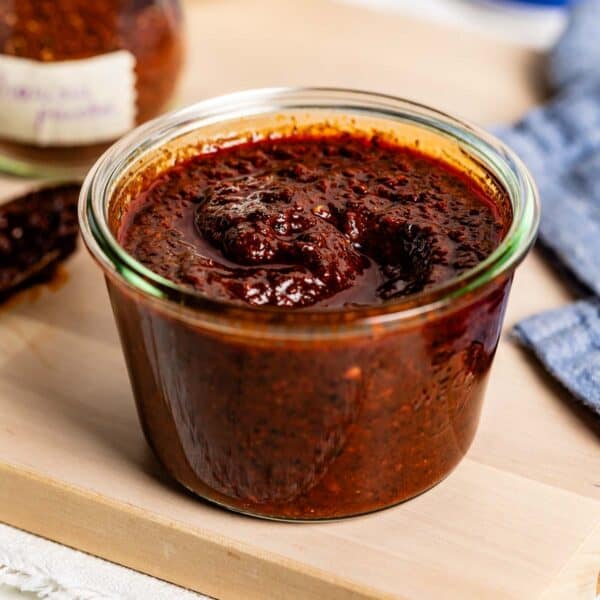 Harissa paste from powder in a jar from the front view.