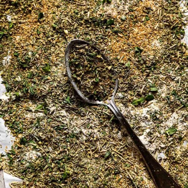 Mediterranean seasoning with a spoon from the top view.