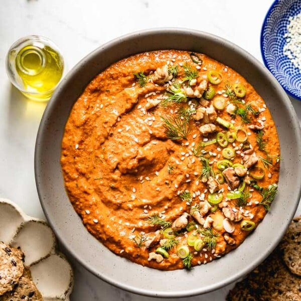 A bowl of muhammara recipe is photographed from the top view