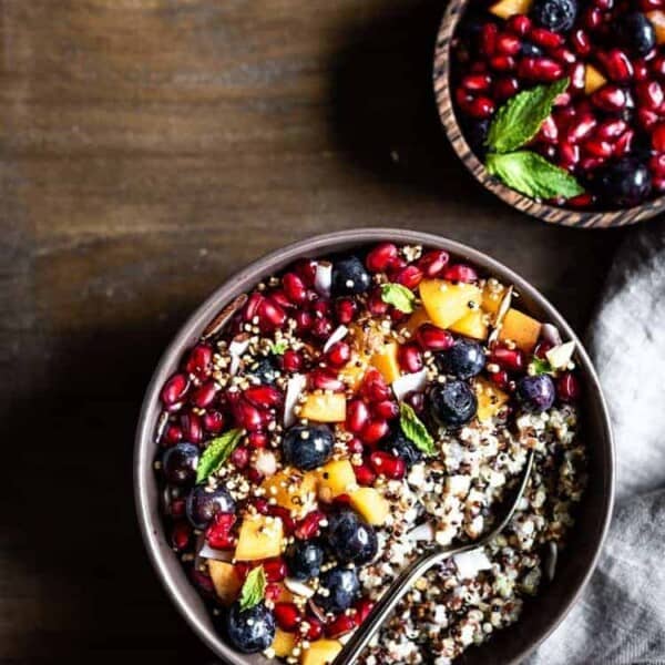 Quinoa Breakfast Porridge topped off with fruits and granola