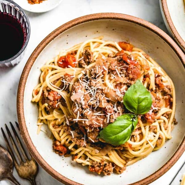 A bowl of spaghetti bolognese photographed in a bowl from the top view