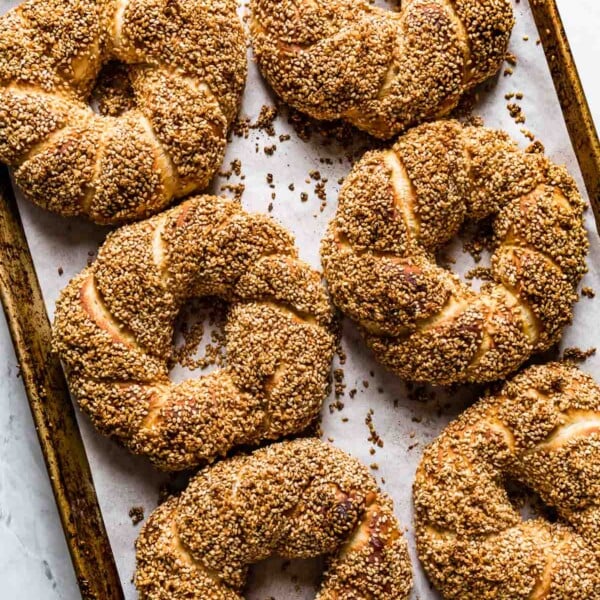 Turkish simit on a sheet pan right out of the oven