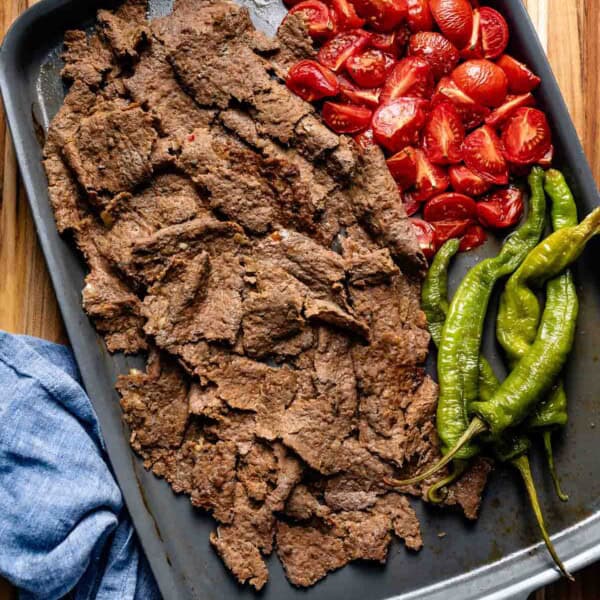 Doner kebab with vegetables on a sheet pan.